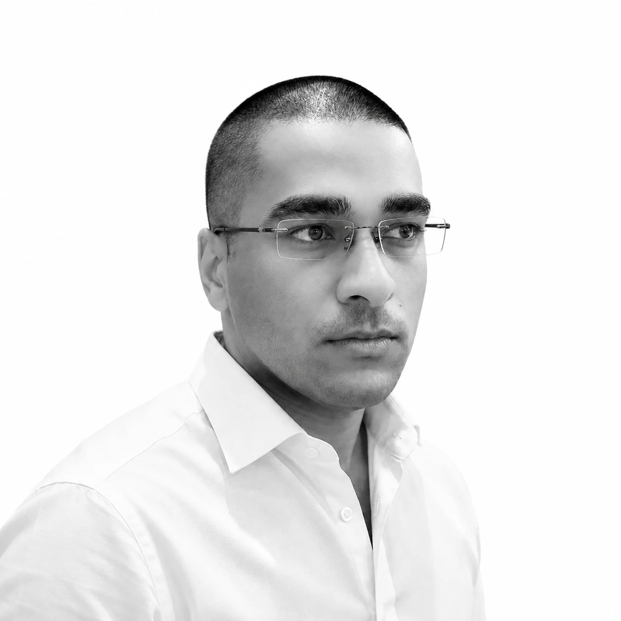 Portrait of WShankara in a white shirt and glasses